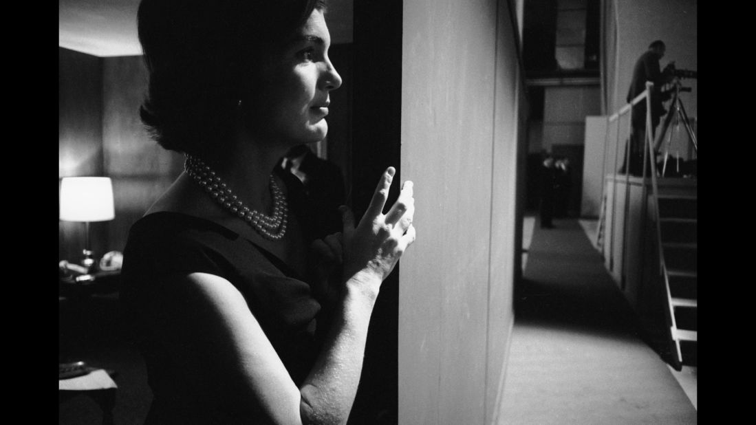 Kennedy's wife, Jacqueline, watches the debate from the wings of the studio.