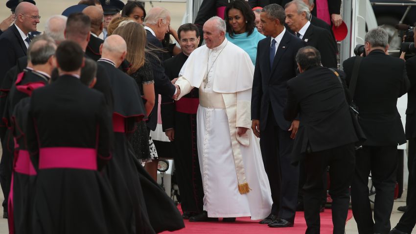 JOINT BASE ANDREWS, MD - SEPTEMBER 22:  Pope Francis shakes hands with Vice President Joe Biden along with U.S. President Barack Obama, first lady Michelle Obama, and other political and Catholic church leaders after arriving from Cuba September 22, 2015 at Joint Base Andrews, Maryland. Francis will be visiting Washington, New York City and Philadelphia during his first trip to the United States as Pope. (Photo by Chip Somodevilla/Getty Images)