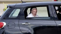 JOINT BASE ANDREWS, MD - SEPTEMBER 22:   (AFP OUT) Pope Francis departs in a Fiat after arriving from Cuba September 22, 2015 at Joint Base Andrews, Maryland. Francis will be visiting Washington, New York City and Philadelphia during his first trip to the United States as Pope.  (Photo by Olivier Douliery-Pool/Getty Images)