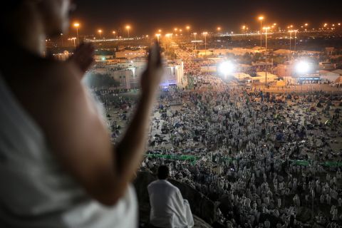 Muslim pilgrims pray on the Mountain of Mercy, on the plain of Arafat. Islam requires every Muslim who is physically and financially able to make the journey to Mecca at least once in his or her lifetime.