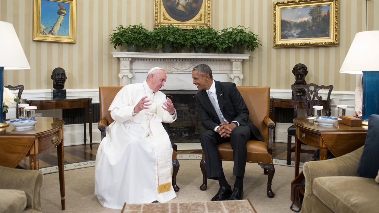 President Barack Obama hosts the Pope in the Oval Office of the White House on September 23.