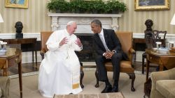 President Barack Obama talks with Pope Francis during a meeting in the Oval Office of the White House on Wednesday, September 23.