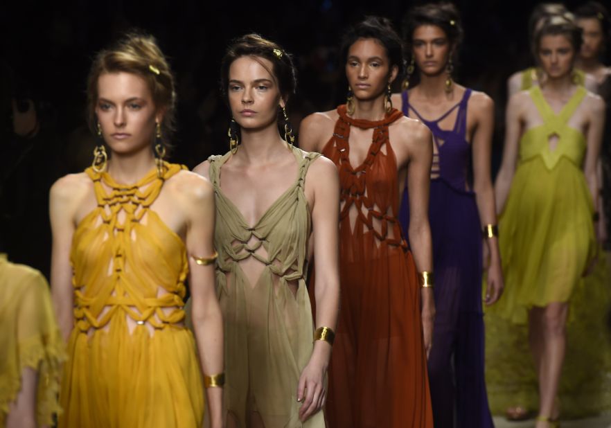 Alberta Ferretti saw models dressed as beautiful, earthy nomads walking down a sandy runway as a screen projected a video of desert dunes overhead. 
