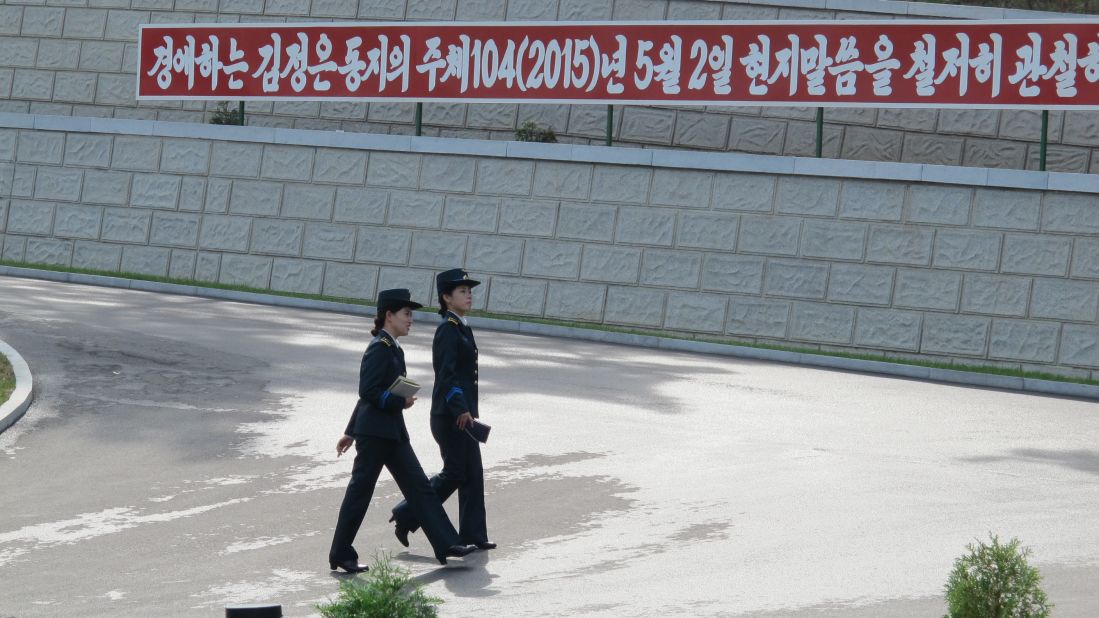 Two officials walk in the grounds of the space facility. NADA officials told CNN that they had prepared multiple satellites and were in the "final stages of perfecting all operations."