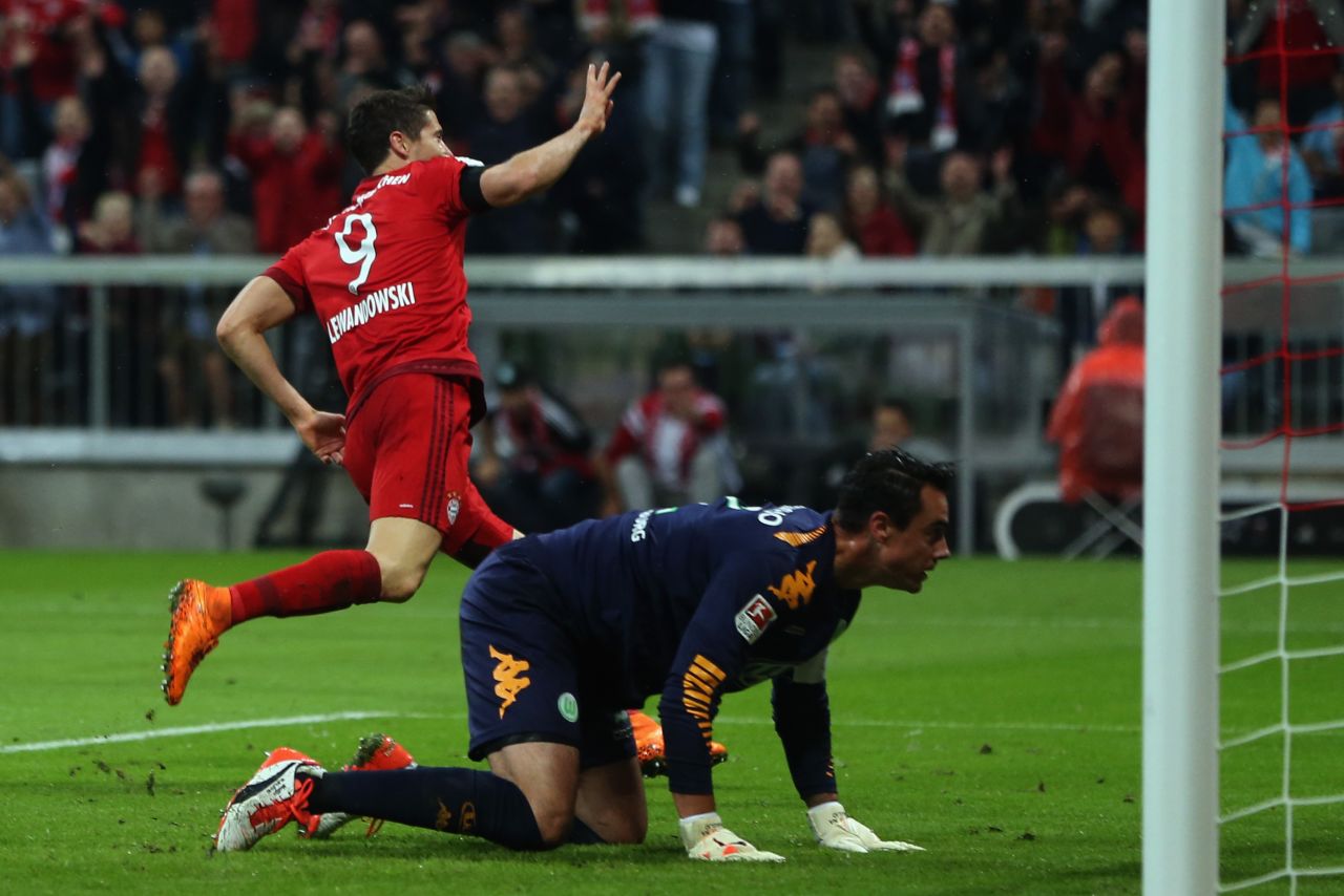 Lewandowski celebrates his fourth goal, with Wolsburg goalkeeper Diego Benaglio probably wondering just what's hit him. This goal, and the Bayern striker's fifth, which came three minutes later, were both sublime finishes.