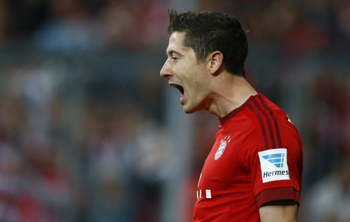 Bayern Munich striker Robert Lewandowski celebrates after scoring during the German Bundesliga soccer match against VfL Wolfsburg at the Allianz Arena stadium. The Polish international made Bundesliga history by scoring five goals in the space of nine minutes as Bayern came from behind to rout Wolfsburg 5-1.