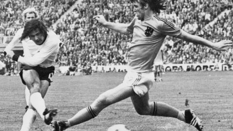 "Der Bomber," Gerd Muller (L) scores the second goal for West Germany despite being pressured by Dutch defender Rudi Krol, on the 7th July 1974 in Munich, during the World Cup final. West Germany defeated the Netherlands 2-1. 