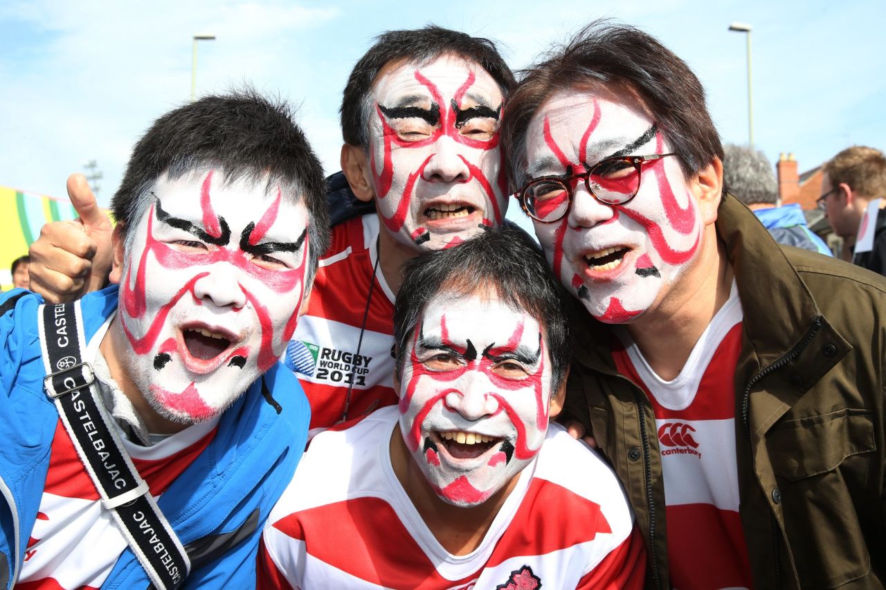 Japan fans get in the mood ahead of kick-off against Scotland at the Kingsholm Stadium.