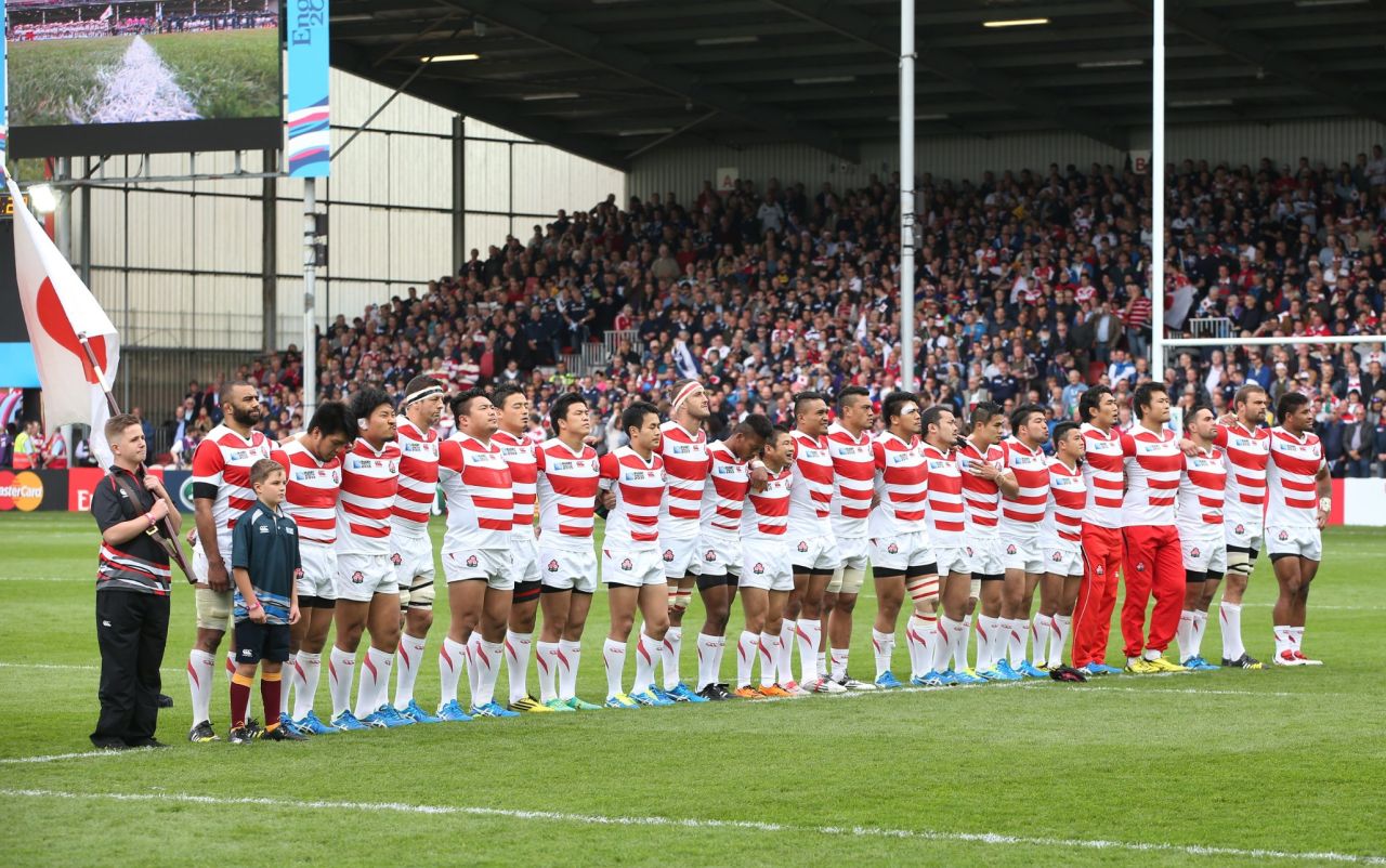 The Japan team line up for the national anthems ahead of the clash with Scotland.