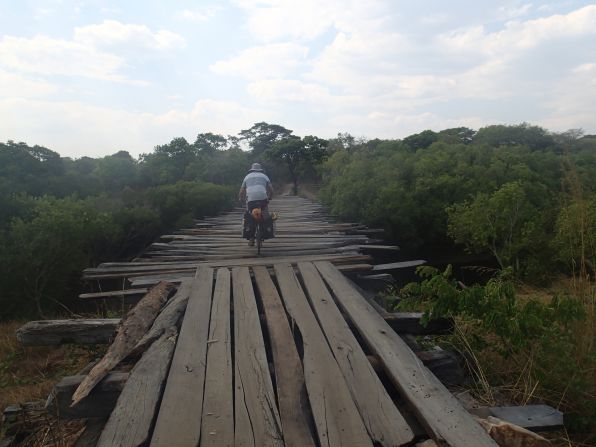 "In Angola, I got to a little village and had no water left. I showed a lady my bottle and she walked around behind two or three mud huts where she had three jerry cans with very gray water that she shared with me. I still don't know to this day where she's got that from -- I didn't see any pumps or wells nearby."