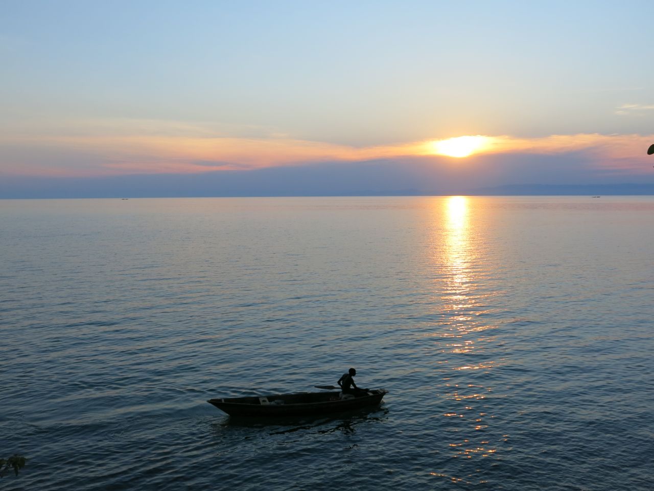 "I knew more of Asia and Europe than I did of Africa, so part of the motivation was to explore my own continent. Africa is the iconic continent of adventure." Pictured, sunset on Lake Tanganyika, Burundi. 