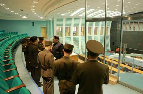 Kim Jong Un is pictured during his visit inside the satellite control center.