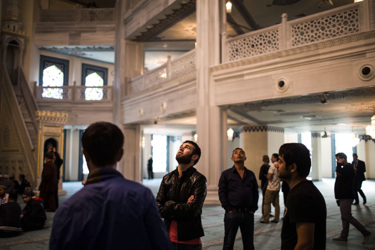 People explore the new mosque.