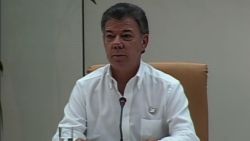 COLOMBIA'S PRESIDENT JUAN MANUEL SANTOS AT PRESSER ANNOUNCING PEACE PROCESS WITH FARC.