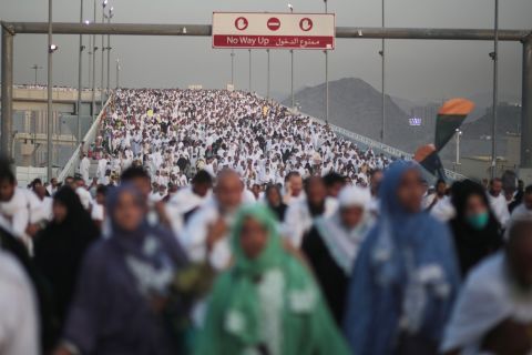 Muslim pilgrims make their way to cast stones at a pillar in the "stoning the devil" ritual Thursday, September 24, in Mina near Mecca, Saudi Arabia. At some point during this last rite of the annual Hajj, <a href="http://www.cnn.com/2015/09/24/world/gallery/saudi-arabia-stampede/index.html">a stampede occurred, killing and injuring hundreds</a>. More than 2 million Muslims have been making the pilgrimage to the holy city of Mecca. The Hajj is one of the most celebrated events in the Islamic calendar.