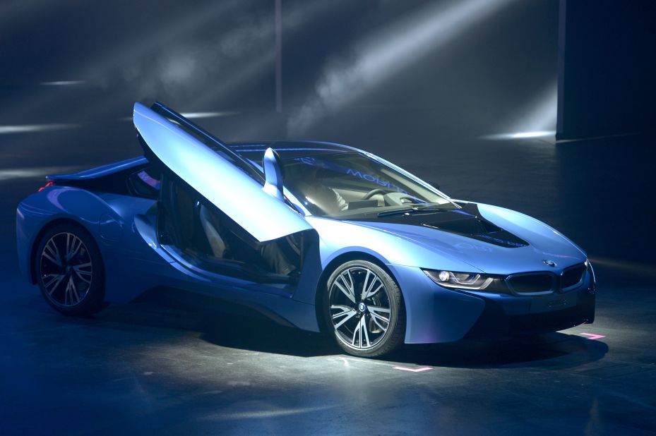 The i8 is powered by both a 1.5-litre 3-cylinder petrol engine tucked away under the seats and a 129bhp electric motor connected to lithium-ion batteries. 
