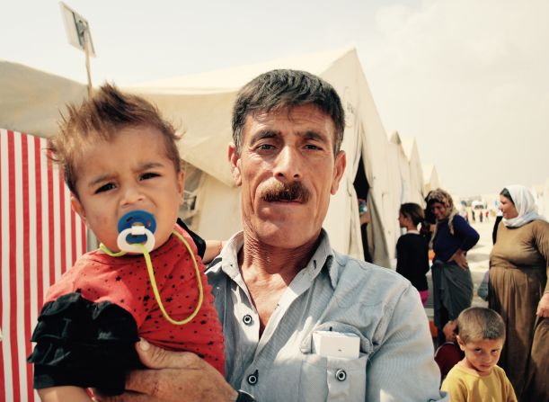 Two-year-old Basman Haidar and his grandfather Haidar Kharmish, have also spent a year in the camp. <br />