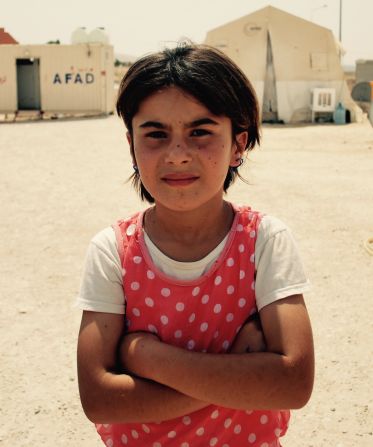 Miada Murad is eight years old, from Sinjar. She has five sisters. 