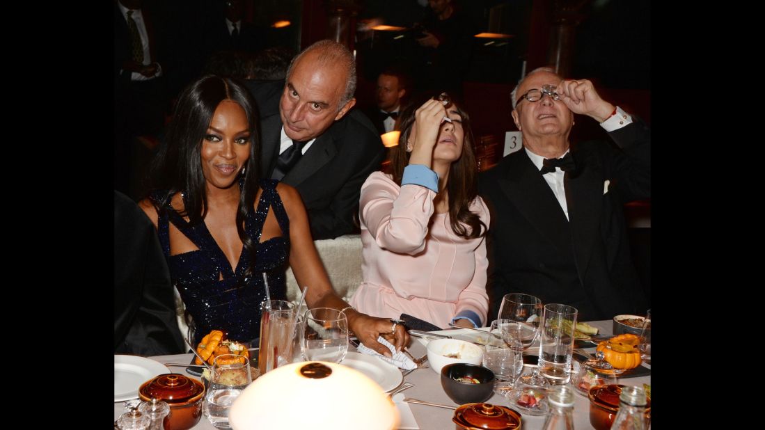 Naomi Campbell, Sir Philip Green and Manolo Blahnik attend the British Fashion Awards at the London Coliseum in 2014 
