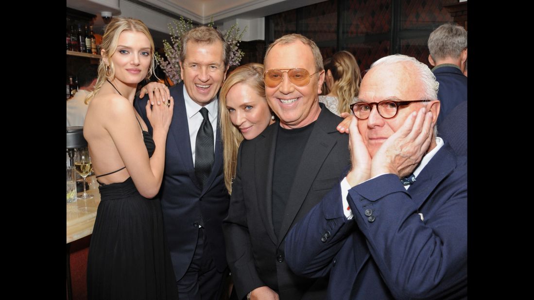Lily Donaldson, Mario Testino, Uma Thurman, Michael Kors and Manolo Blahnik attend the "Icons of Style" dinner hosted by Michael Kors and Vanity Fair in London earlier this year. 