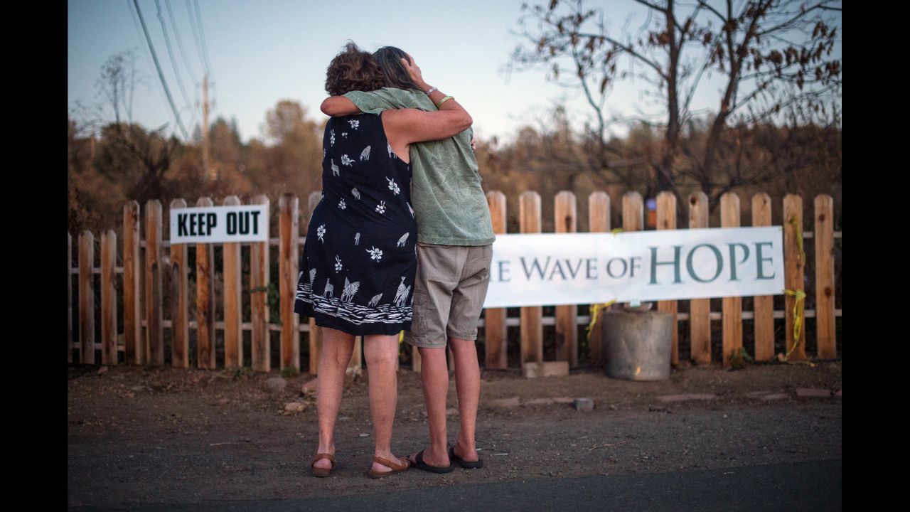 Sharon Dawson, right, embraces a friend Monday, September 21, after she lost her home to a wildfire in Middletown, California. The American West has seen <a href="http://www.cnn.com/2015/09/20/us/california-wildfires-homes-burned/" target="_blank">one of its worst fire seasons</a> this year, burning through a particularly large area of the landscape, <a href="https://www.nifc.gov/fireInfo/nfn.htm" target="_blank" target="_blank">according to the National Interagency Fire Center.</a>