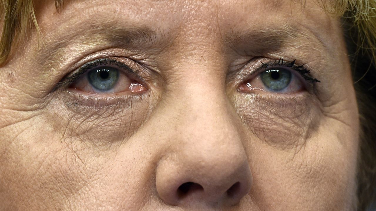 German Chancellor Angela Merkel watches the media after an emergency summit on the migration crisis Thursday, September 24, in Brussels, Belgium. The president of the European Union <a href="http://www.cnn.com/2015/09/23/europe/europe-migrant-crisis/index.html" target="_blank">announced an increase in financial aid</a> to help nations deal with the influx of migrants.