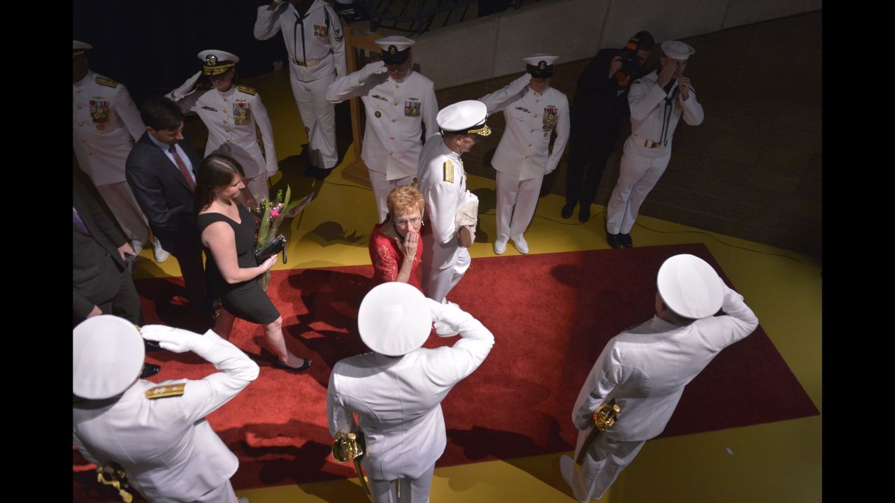 Darleen Greenert, the wife of the U.S. Navy's chief of operations, blows a kiss to sailors during a change-of-command ceremony held Friday, September 18, in Annapolis, Maryland. Adm. Jonathan Greenert was retiring. 