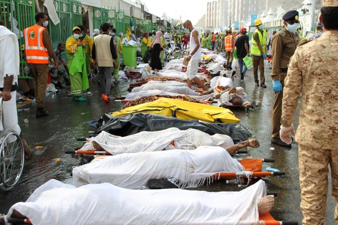 Saudi emergency personnel surround bodies of Hajj pilgrims at the site of a stampede Thursday, September 24, in Mecca, Islam's holiest city. Thursday morning's stampede killed hundreds during one of the last rituals of the<a href="index.php?page=&url=http%3A%2F%2Fwww.cnn.com%2F2015%2F09%2F23%2Fworld%2Fgallery%2Fhajj%2Findex.html"> Hajj, the annual Islamic pilgrimage</a>.