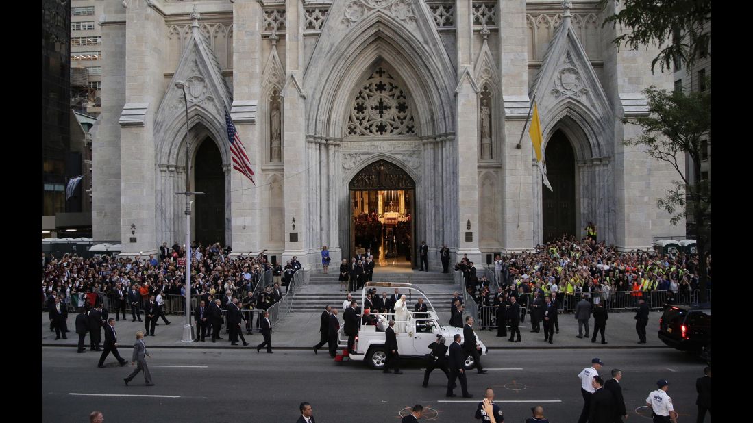 Francis greets crowds as he arrives at St. Patrick's Cathedral.