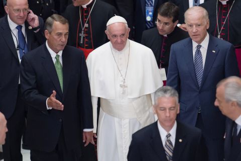 Pope Francis walks with Speaker Boehner and Vice President Joe Biden after delivering a speech to Congress in Washington on September 24.