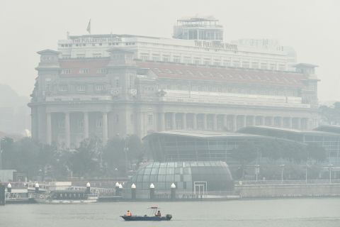 The Fullerton Hotel, a Singapore landmark, is blanketed in thick smog on September 24.