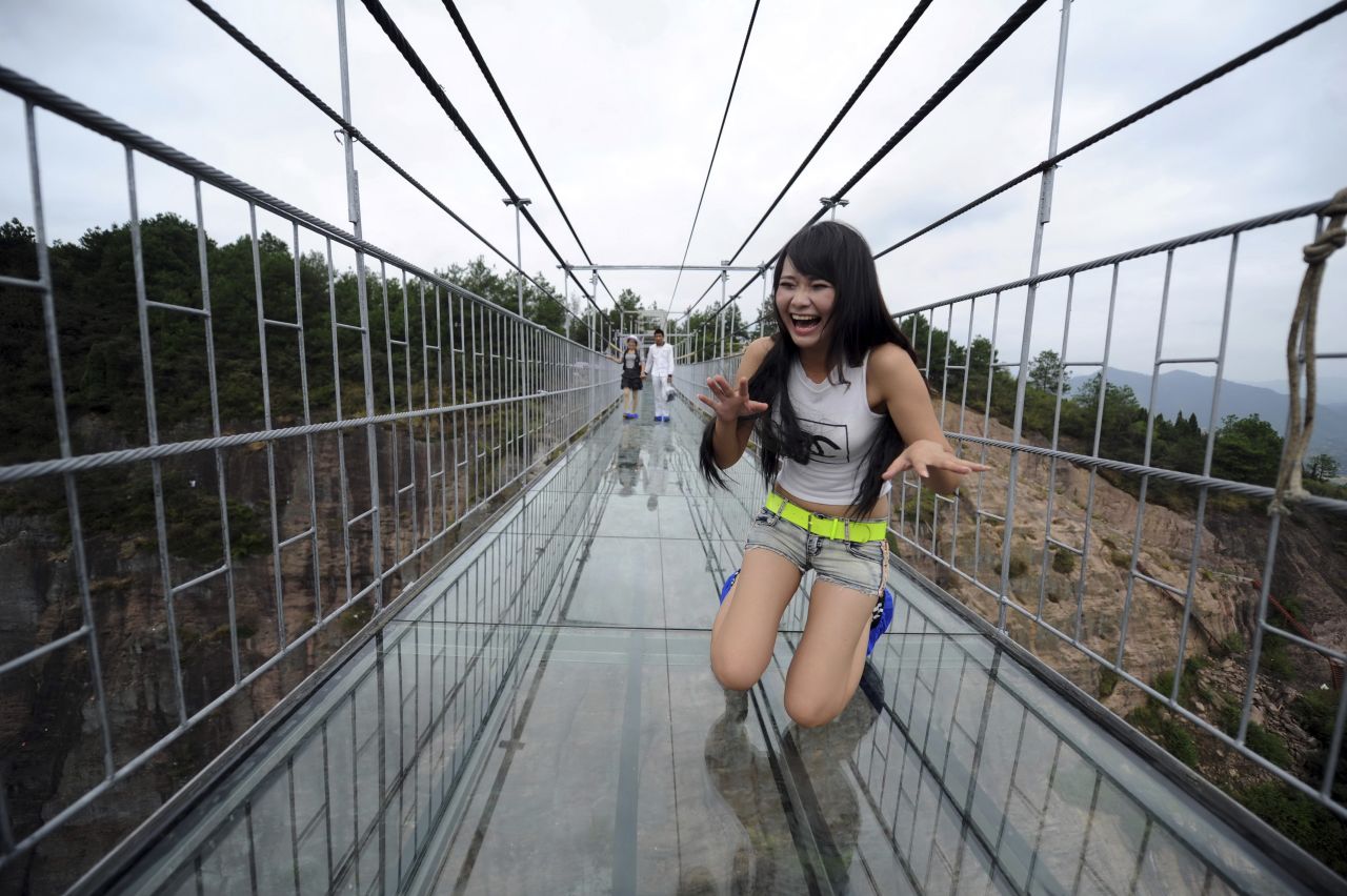 It's called Haohan Qiao -- Brave Men's Bridge in English. The 300-meter-long overpass in Shiniuzai National Park in southern China has a bottom made of glass, allowing walkers to see the stomach-churning view below their feet. 
