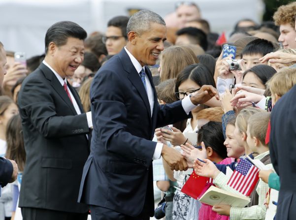 Obama and Xi greet guests at the ceremony.