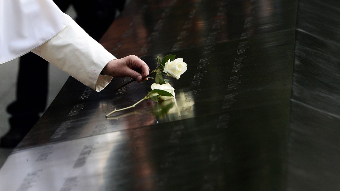 Pope Francis places a white rose at the 9/11 memorial in New York on September 25.