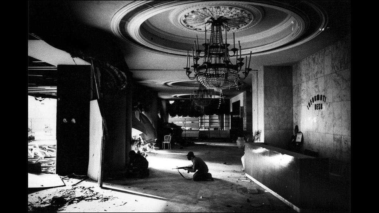 Christian gunmen in the foyer of a Holiday Inn battle Palestinians in Beirut, Lebanon, in 1976.