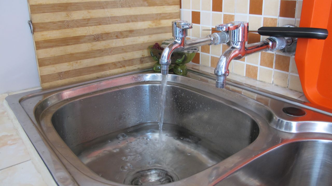 A sink with two faucets is spotted inside a model apartment -- an innovation not often seen in farmers' apartment. Unfortunately, the hot water faucet was not working when CNN visited. Hot water is only supplied at certain times, we were told.