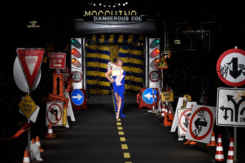 At Moschino, Jeremy Scott pushed the boundaries of taste with kitschy garments made from feathers, road-signs, and traffic cones, and even outfits resembling the rollers from a car wash.