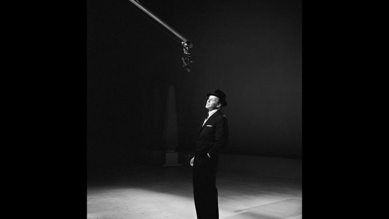 Frank Sinatra was called, simply, "The Voice." But his prized pipes only told part of the story. Sinatra was also an Oscar-winning actor, a shrewd judge of songcraft and a champion showman. <a href="index.php?page=&url=http%3A%2F%2Fwww.abramsbooks.com%2Fproduct%2Fsinatra_9781419717925%2F" target="_blank" target="_blank">"Sinatra: The Photographs"</a> captures the man through the years as he went from teen idol to world-renowned artist. Here, he  rehearses for "The Frank Sinatra Timex Show" in October 1959.