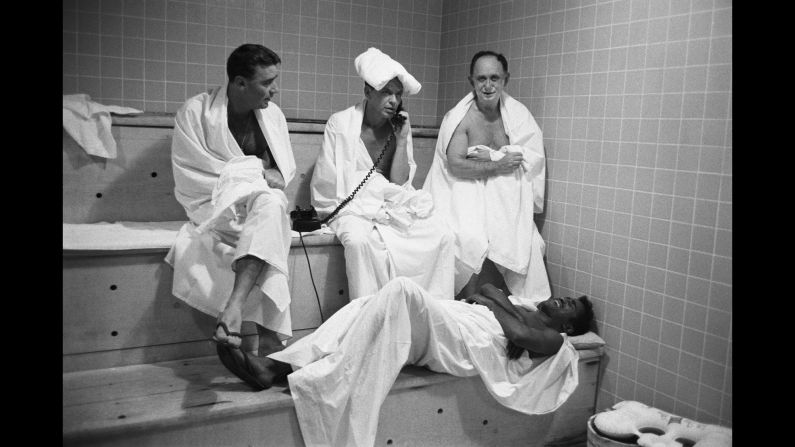 Sinatra soon became well known for his adventures with the "Rat Pack," a group of high-living friends that included Sammy Davis Jr., Peter Lawford and Dean Martin. The gang was closely associated with Las Vegas, where they performed and where Sinatra had a steam room built for the Sands Hotel. Here, Sinatra (on the phone) is joined in 1960 by Lawford, left; Davis, lying on the bench; and banker Al Hart.