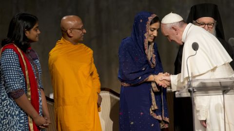 Pope Francis offers Gunisha Kaur a blessing for her baby.