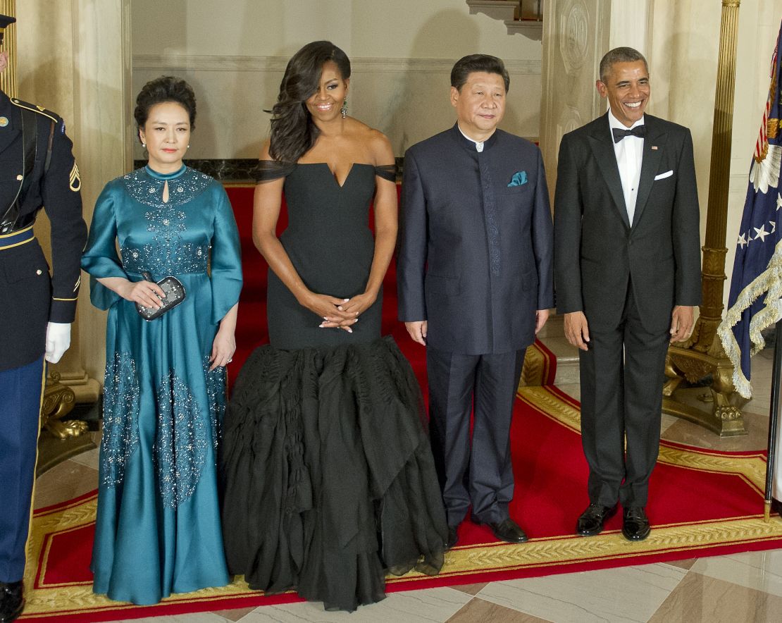 Chinese President Xi Jinping's wife Peng Liyuan, first lady Michelle Obama, Chinese President Xi Jinping and President Barack Obama pose for a formal photo prior to a state dinner at the White House, September 25.