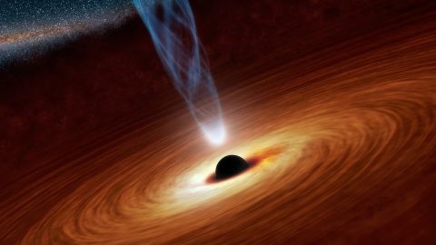 This artist's concept illustrates a supermassive black hole with millions to billions times the mass of our sun.