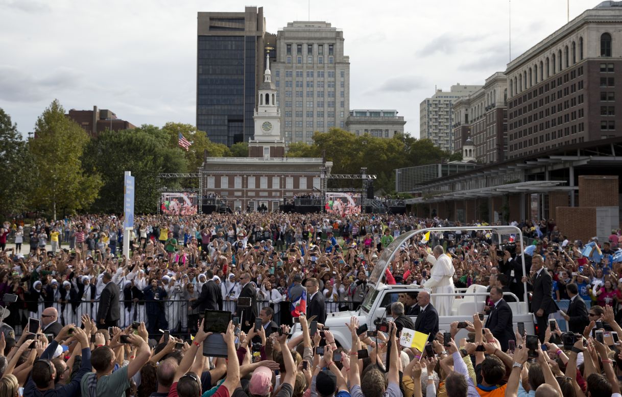 Pope Francis rides in the Popemobile along Independence Mall before delivering a speech outside Independence Hall on September 26. 