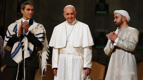 Pope Francis stands alongside Rabbi Elliot J. Cosgrove and Iman Khalid Latif, Executive Director of the Islamic Center and chaplain at New York University, during a visit to the 9/11 Memorial and Museum Friday.