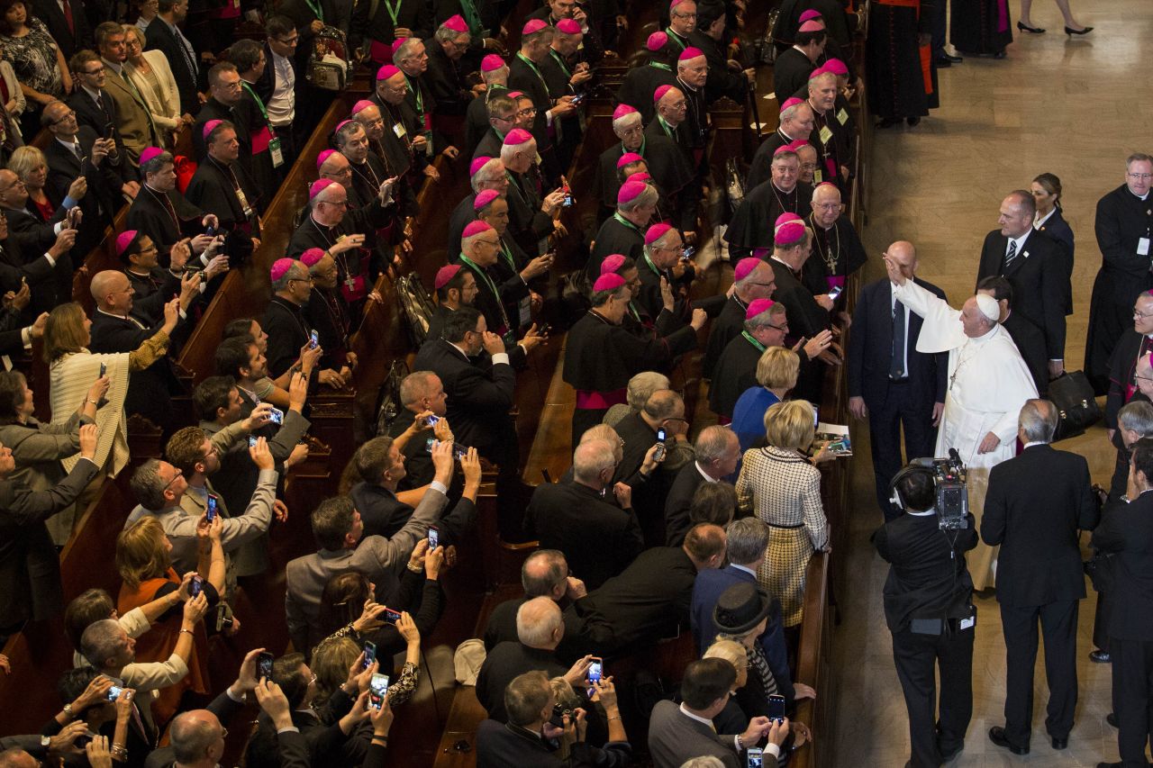 Pope Francis waves to the audience as he leaves Saint Charles Borromeo Seminary in Wynnewood, Pennsylvania, after addressing bishops on September 27. 