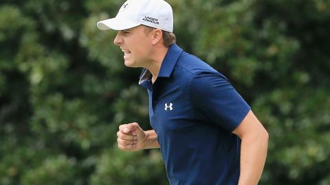 Jordan Spieth celebrates a crucial birdie putt on his way to victory in the Tour Championship in Atlanta.  