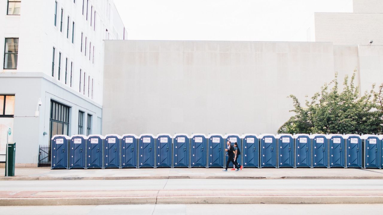 People pass by a long line of port-a-potties. Philadelphia was prepared for the large crowds days ahead of time. "It was kind of surreal," Dwyer said.