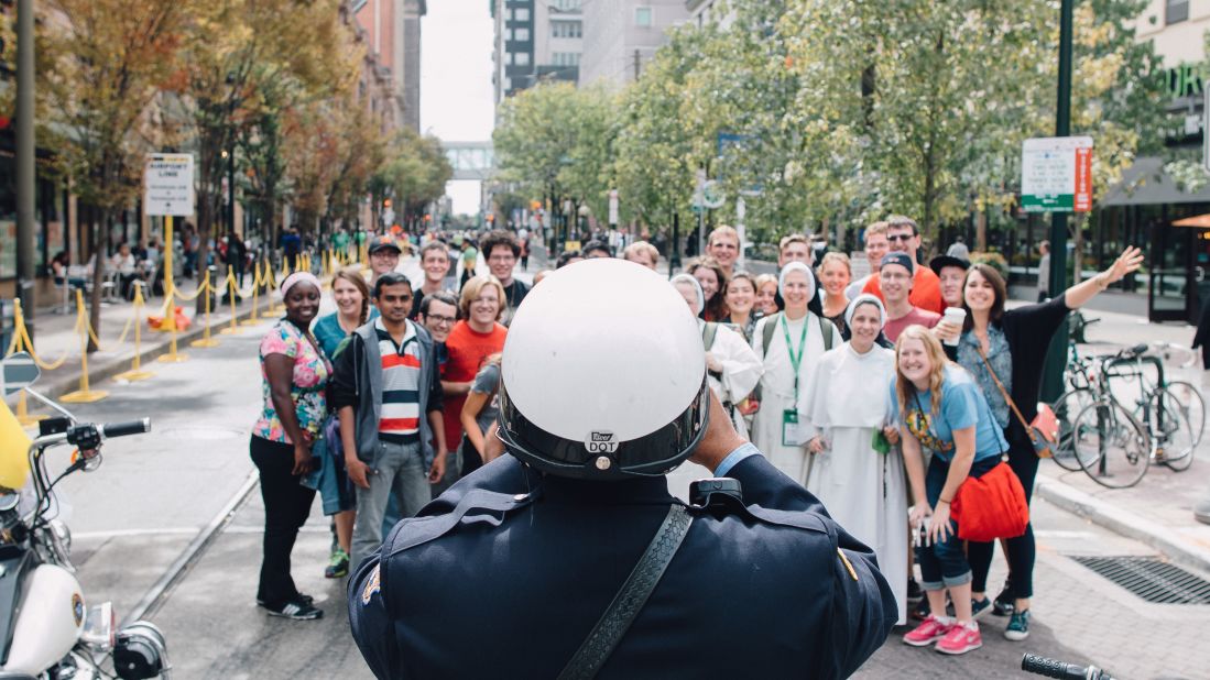 Dwyer said, "The Philly police department had such a positive presence at the events. They worked long hours but said that we made it easy on them. This motorcycle officer stopped to take a group photo."
