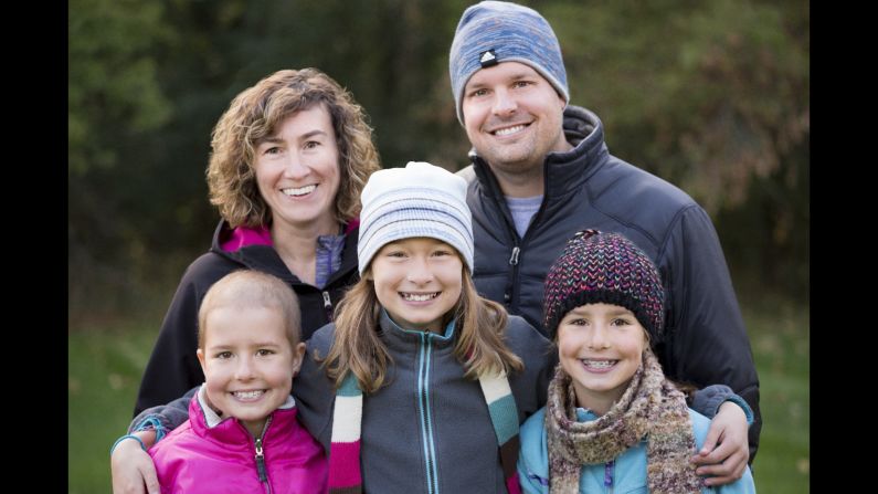 The Dove family has been struck by leukemia twice. Lily, left, was diagnosed in 2013. Her identical twin, Bailey, right, was just diagnosed in March 2015. Their parents, Erin and Ryan, and older sister, Maddie, try to maintain a sense of normalcy for the girls. Click through the gallery to learn more about their story.