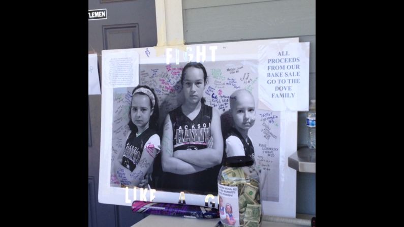 Lily and Bailey love playing sports. The family motto is "fight like a girl." They took this photo with Maddie ahead of a softball tournament. 